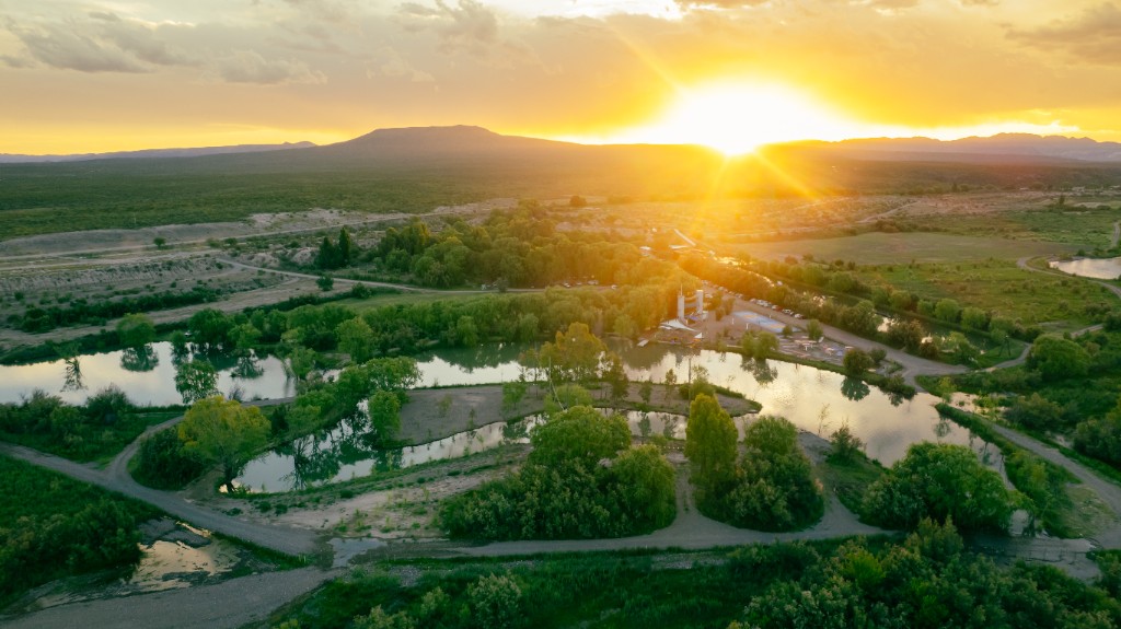 Aerial view of La Rivera Country Estate at sunset